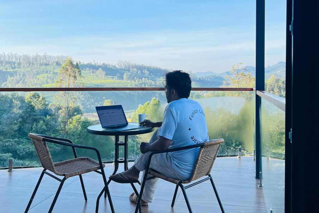 A spacious and cozy family suite at Ooty Homz, surrounded by serene landscapes, offering privacy and comfort for a memorable family vacation in Ooty."